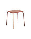 A rust red colored ESA stool with a metal frame and a PU leather seat.
