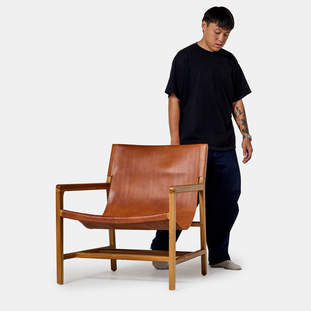 Hadi armchair in brown leather