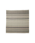 A striped pattern bed cover laid out flat, showcasing various shades of gray and white stripes.