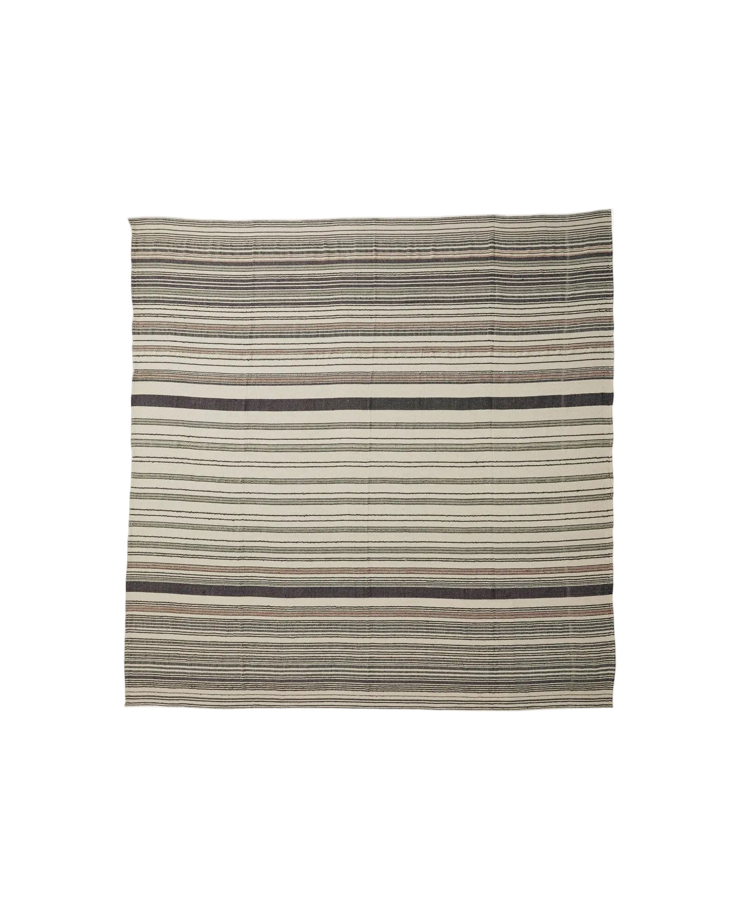 A striped pattern bed cover laid out flat, showcasing various shades of gray and white stripes.