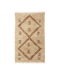 A rectangular carpet with a classic Moroccan geometric pattern in beige and brown tones.