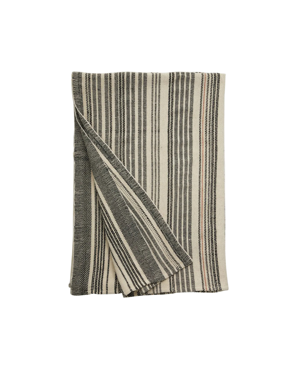 A folded striped bed cover in varying shades of gray and beige, with a decorative pattern.