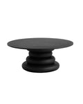Black round table with stacked design on a white background