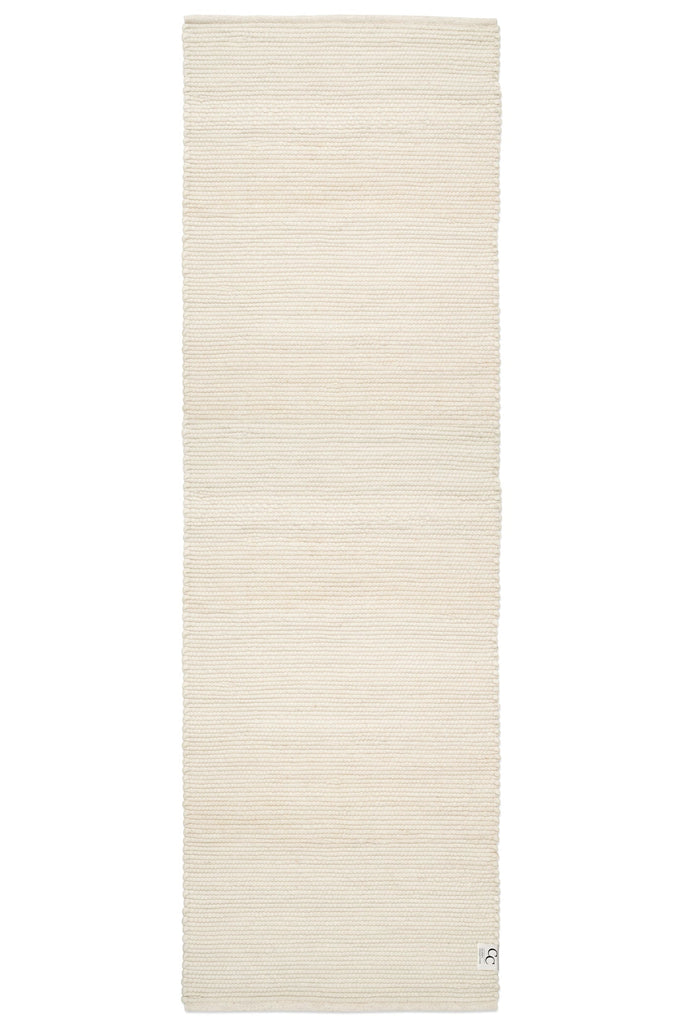 Beige rug on a white background