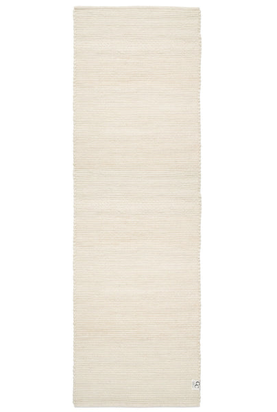 Beige rug on a white background
