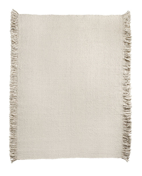 A beige wool rug with frayed edges on a white background.