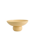 A decorative aluminum bowl with a light yellow finish, featuring a soft shape with a raised foot, intended for use in home decor.