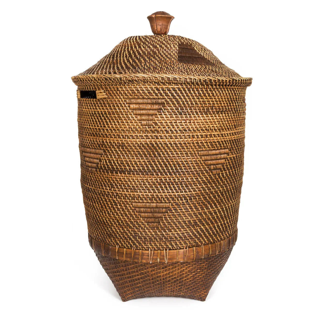 A natural brown handwoven rattan laundry basket with a lid.