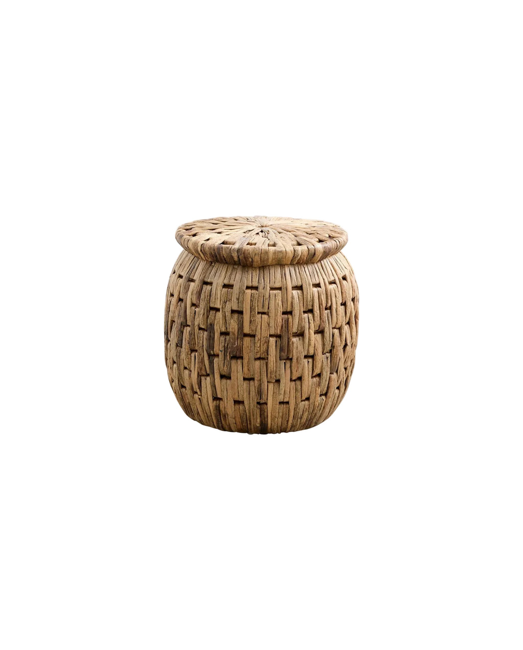 A round, natural seagrass footstool/side table woven together with variations in color.