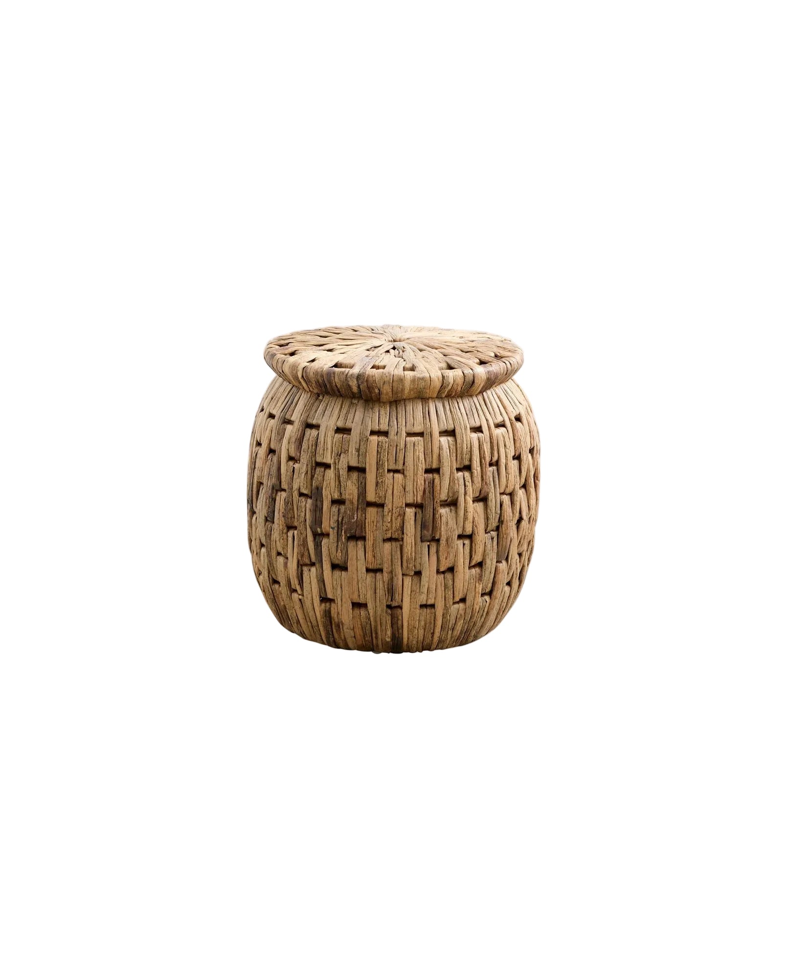 A round, natural seagrass footstool/side table woven together with variations in color.