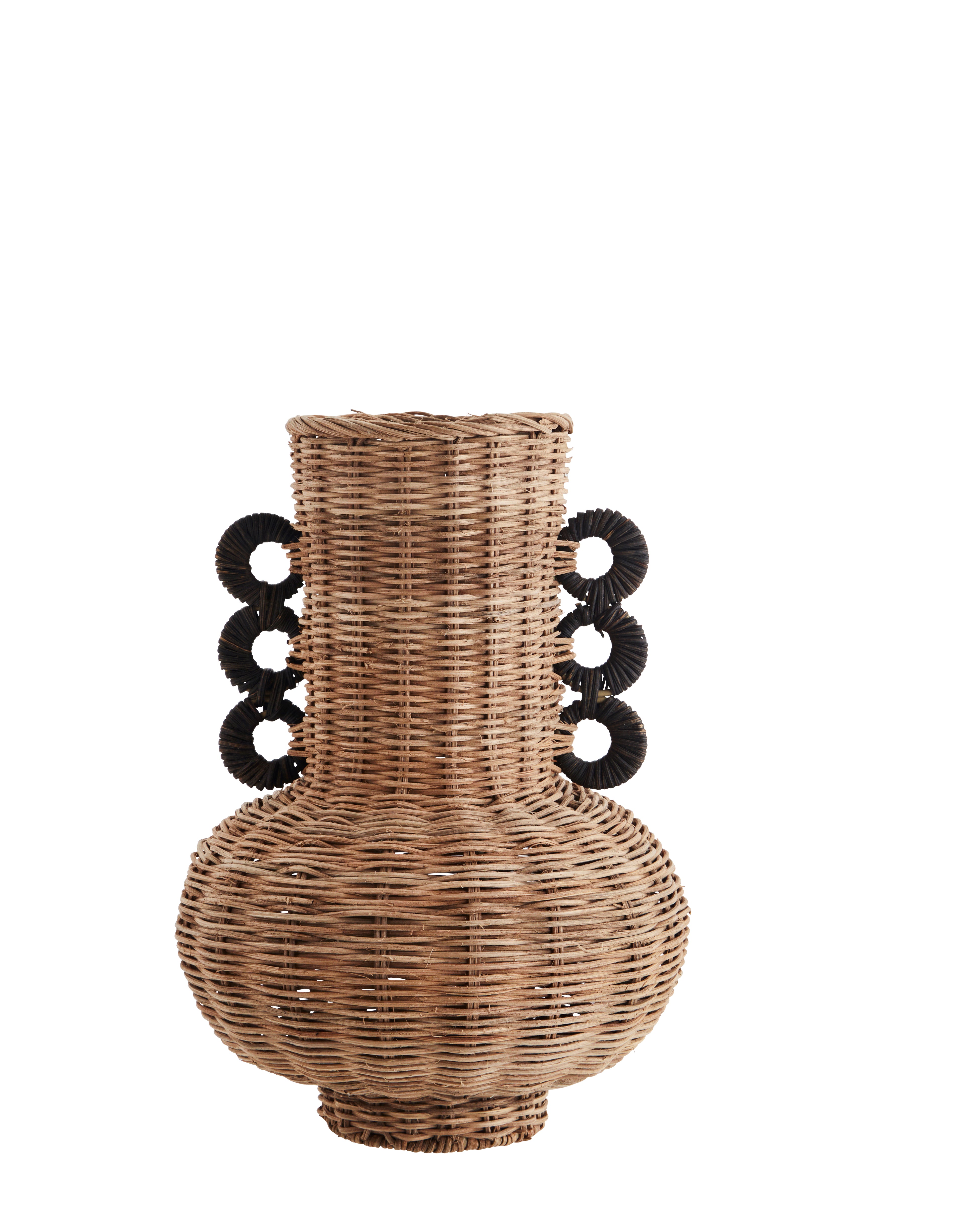 A tall, cylindrical rattan vase with black accents on a white background.