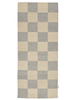 Checkered rug with beige and gray squares on a white background