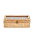 A decorative jewelry box made of rattan with a glass lid and velvet-lined compartments.