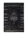 A rectangular, flatweave rug with a dark grey and black color pattern, featuring an intricate, antique-looking design.