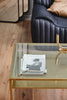 ETNE coffee table, golden with clear glass, 70 x 70