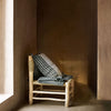 DOUM CHAIR IN PALMLEAF & WOOD